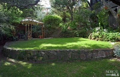 Cloudview Circle Sausalito, CA 94965 - Photo 4 of 11 a view of a table and chairs under an umbrella
