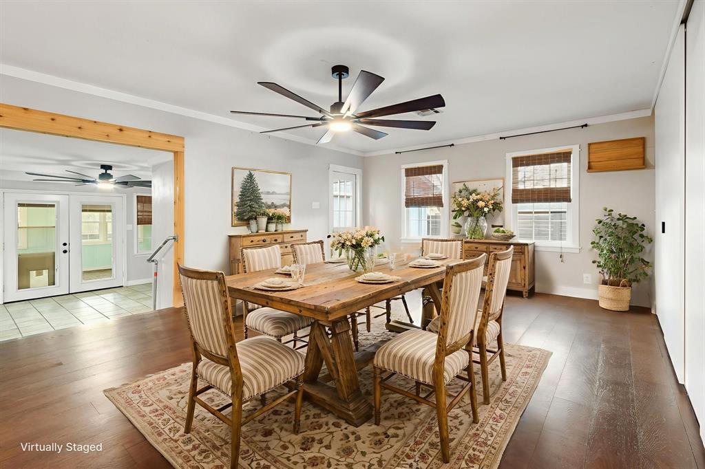 2208 Lake Ridge Circle Waco, TX 76710 - Photo 23 of 40 Dining space featuring ceiling fan, french doors, hardwood / wood-style floors, and crown molding