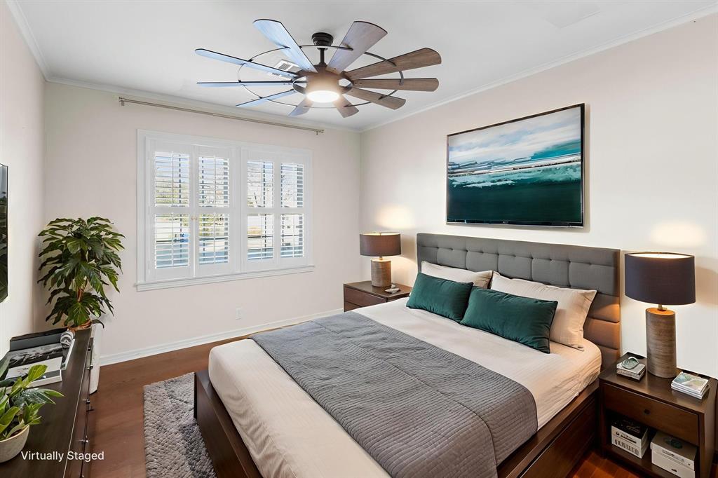 2208 Lake Ridge Circle Waco, TX 76710 - Photo 28 of 40 Bedroom featuring crown molding, ceiling fan, and dark wood-style flooring