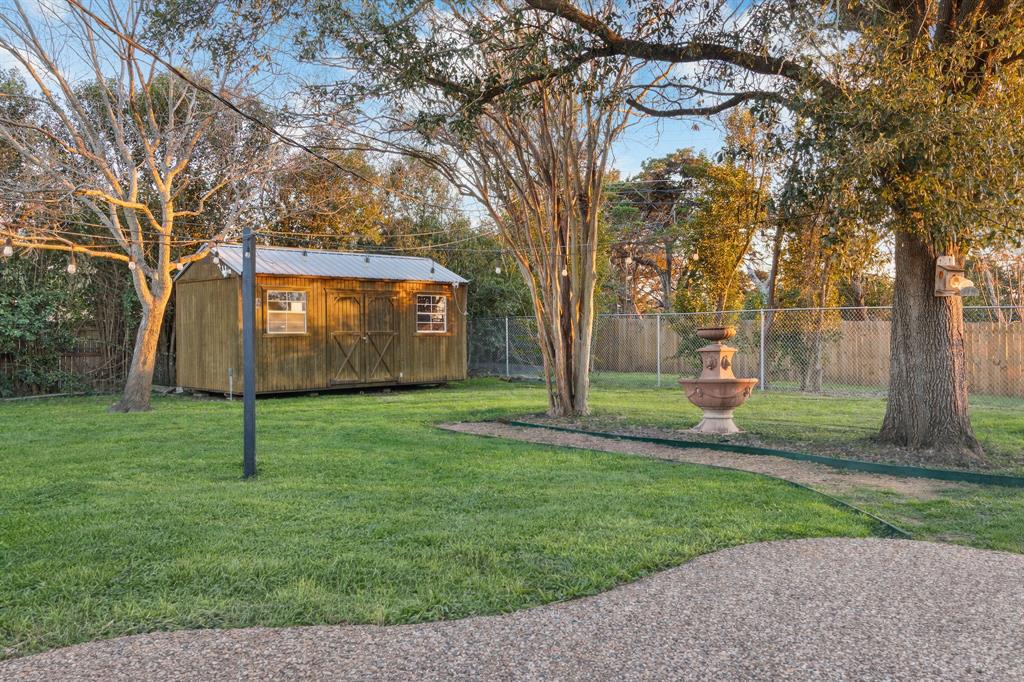 2208 Lake Ridge Circle Waco, TX 76710 - Photo 40 of 40 Fenced backyard featuring a storage shed