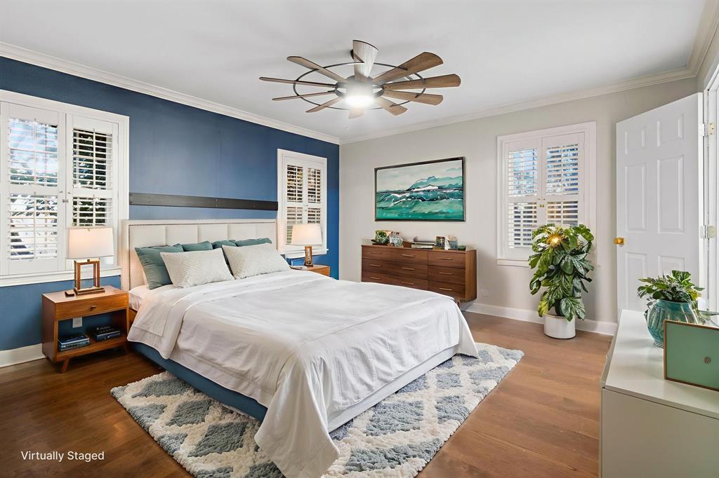 2208 Lake Ridge Circle Waco, TX 76710 - Photo 5 of 40 Bedroom with dark wood-style flooring, crown molding, and a ceiling fan