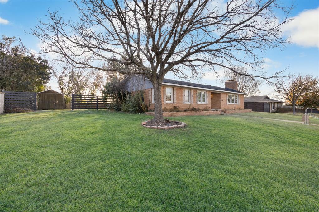 2208 Lake Ridge Circle Waco, TX 76710 - Photo 8 of 40 View of front facade featuring a chimney and brick siding
