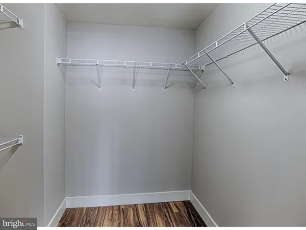 a view of a room with racks on the wall