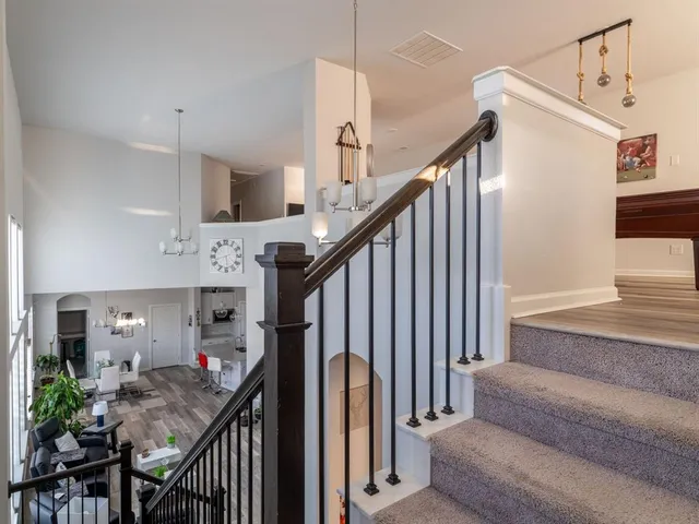 a view of entryway livingroom and hall