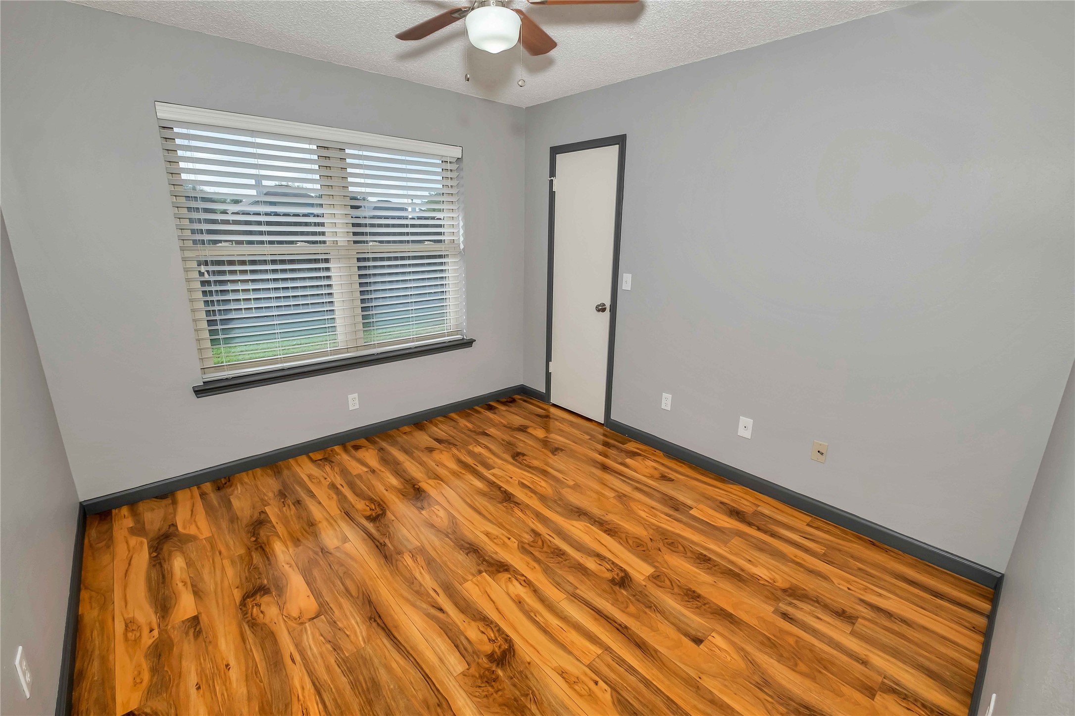 5216 Spring Branch Drive Pearland, TX 77584 - Photo 14 of 17 a view of an empty room and a window