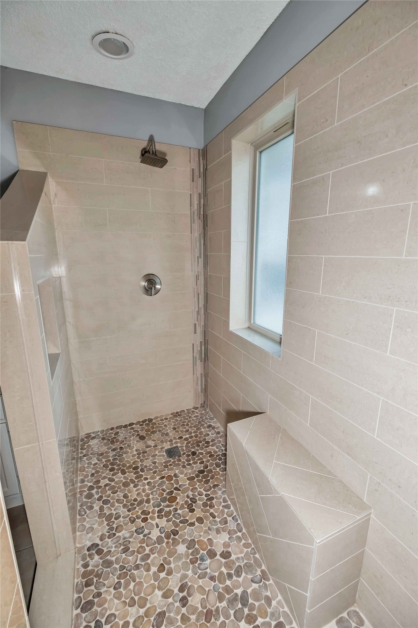 5216 Spring Branch Drive Pearland, TX 77584 - Photo 10 of 17 a bathroom with a sink a toilet and shower