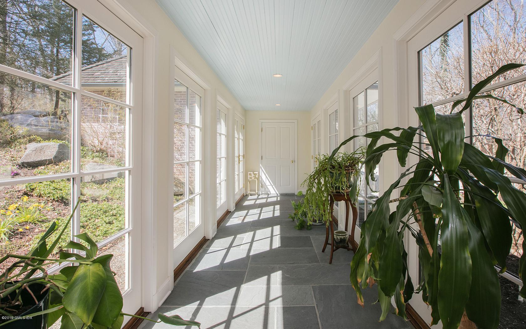 2 Laurel Lane Greenwich, CT 06830 - Photo 23 of 35 a view of entryway with wooden floor
