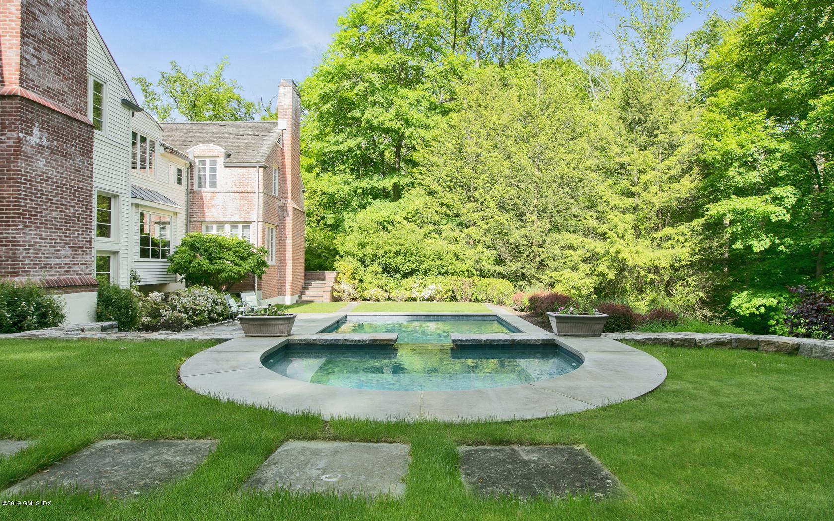 2 Laurel Lane Greenwich, CT 06830 - Photo 28 of 35 a view of a fountain in front of a house