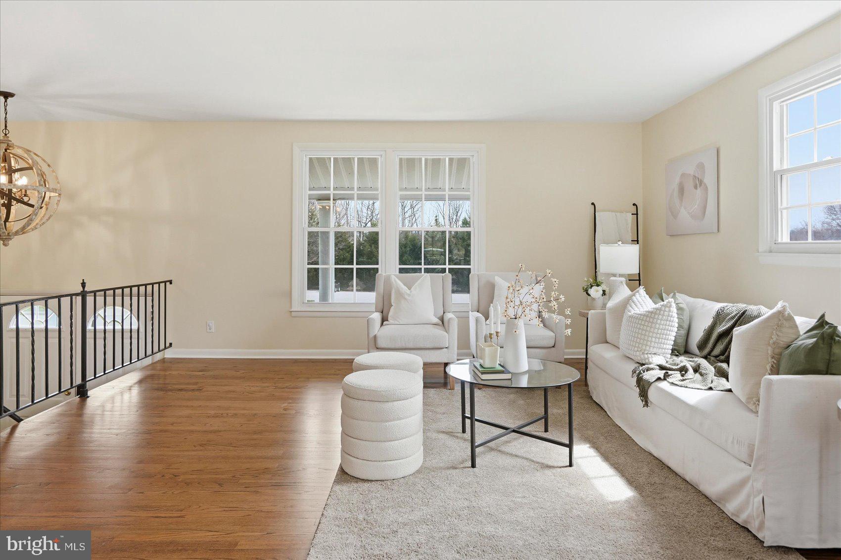 8610 Valleyfield Road Lutherville-Timonium, MD 21093 - Photo 15 of 29 a living room with furniture and wooden floor
