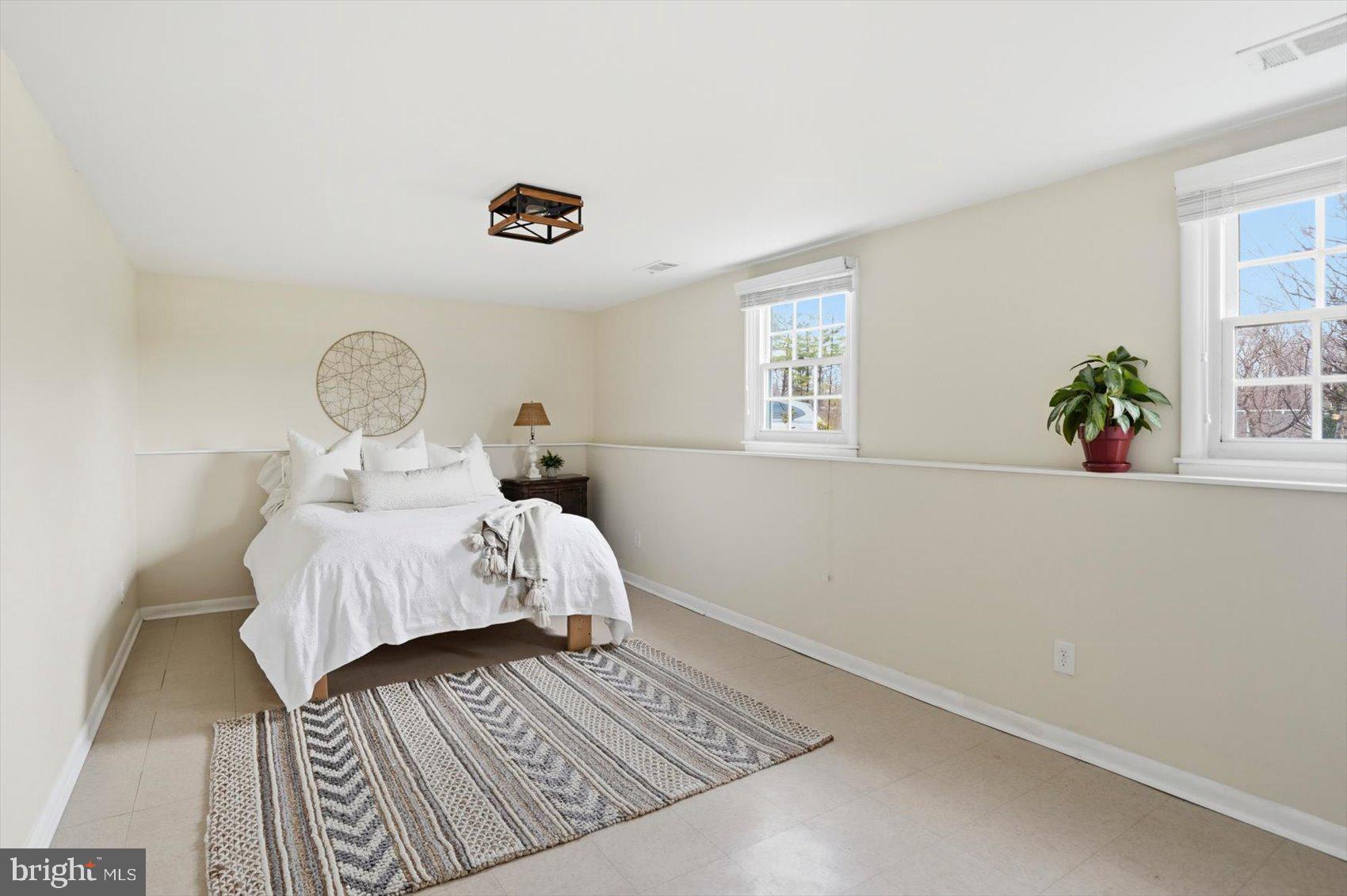 8610 Valleyfield Road Lutherville-Timonium, MD 21093 - Photo 22 of 29 a bedroom with a bed and window