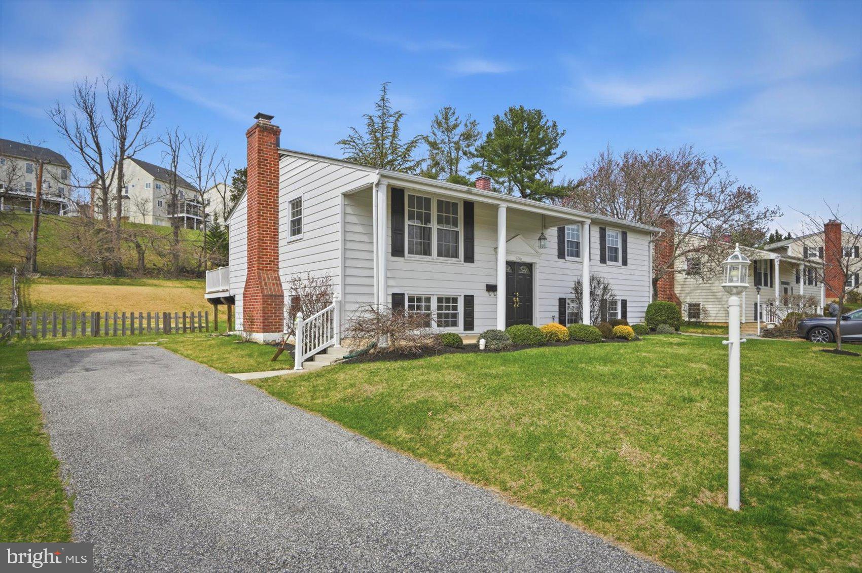 8610 Valleyfield Road Lutherville-Timonium, MD 21093 - Photo 27 of 29 a view of a house with backyard and porch