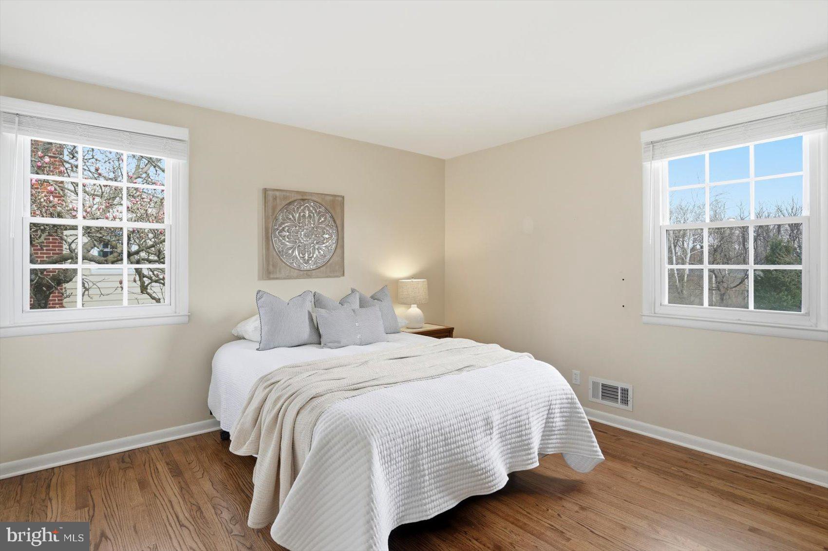 8610 Valleyfield Road Lutherville-Timonium, MD 21093 - Photo 7 of 29 a bedroom with a bed and a large window
