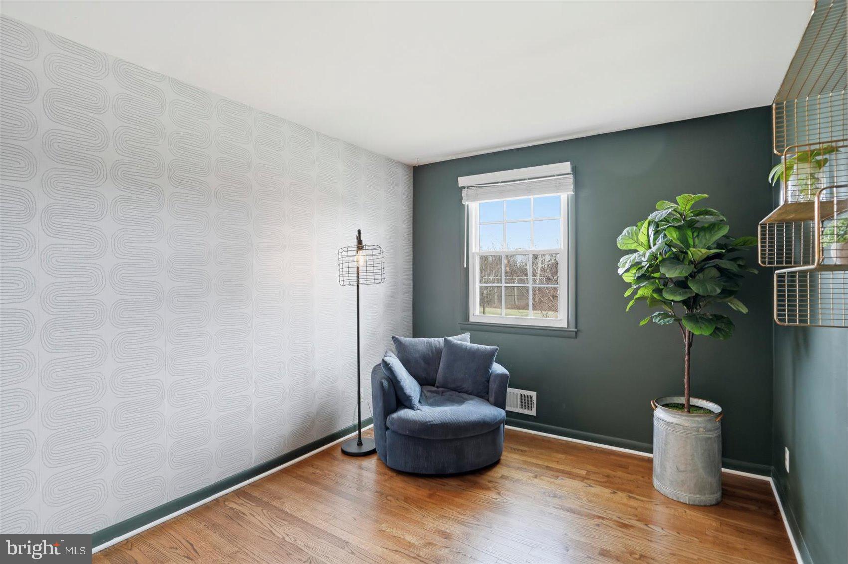 8610 Valleyfield Road Lutherville-Timonium, MD 21093 - Photo 8 of 29 a living room with furniture and a potted plant