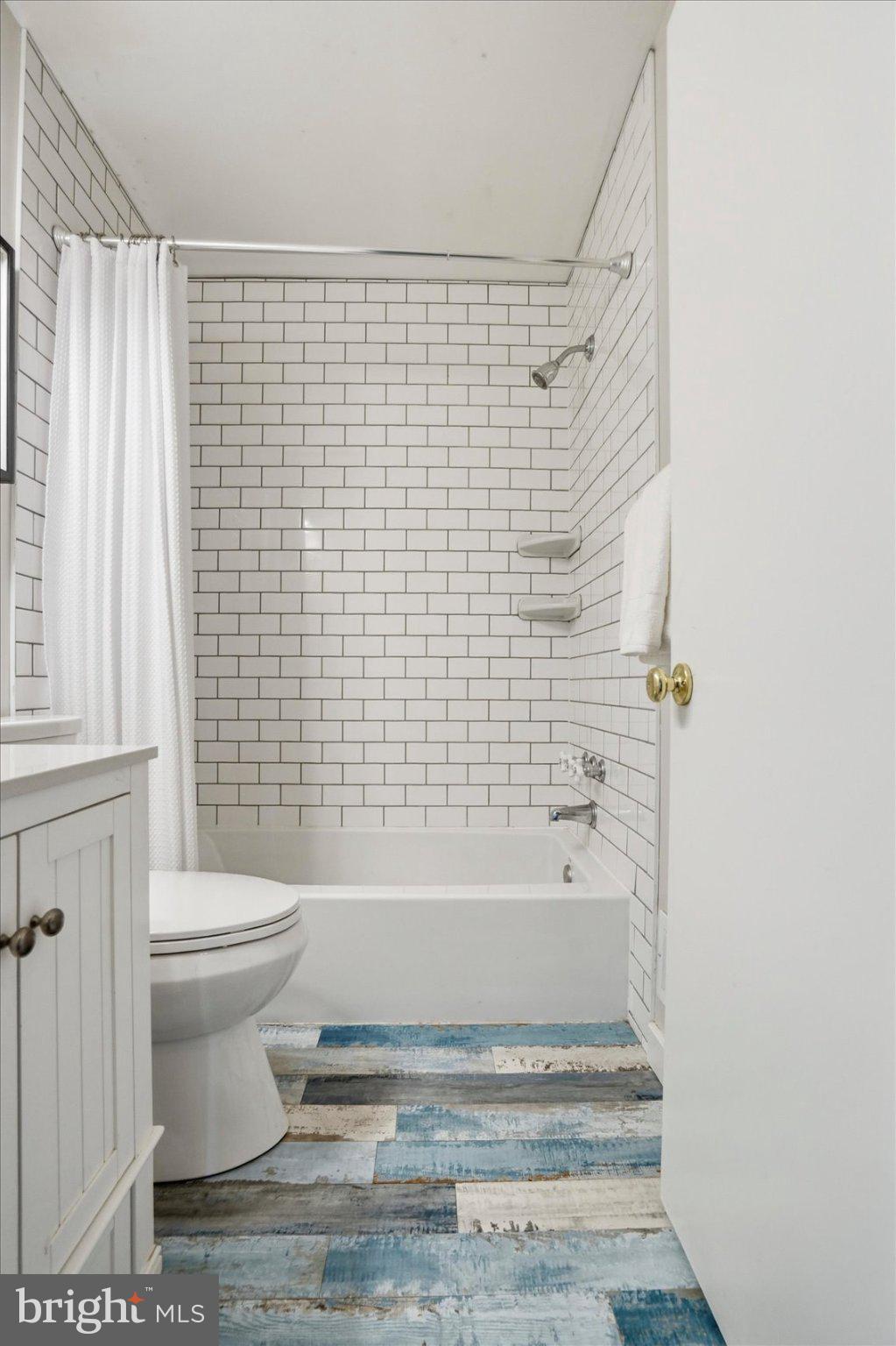 8610 Valleyfield Road Lutherville-Timonium, MD 21093 - Photo 10 of 29 a bathroom with a toilet and a shower