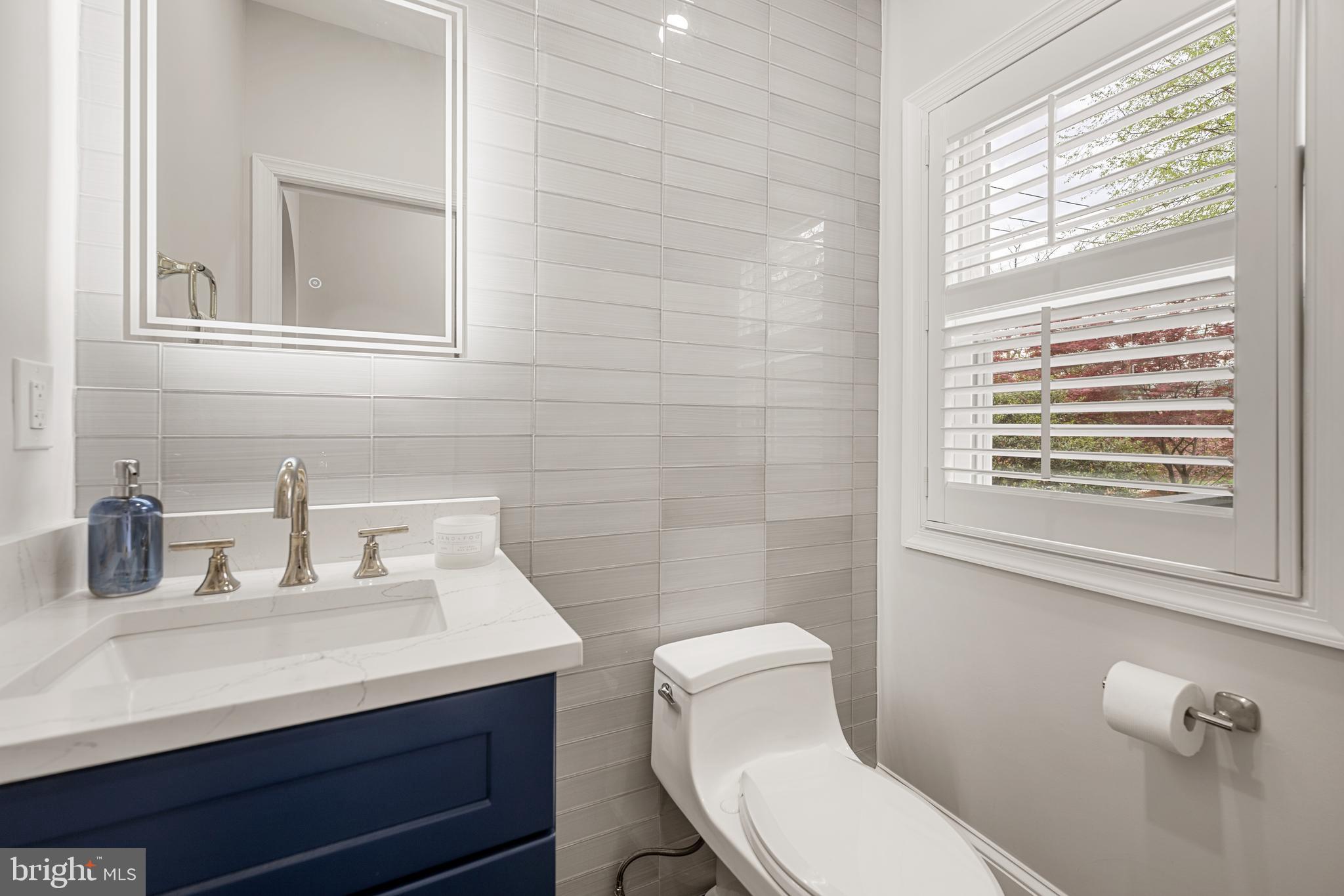 3702 Jenifer Street Northwest Washington, DC 20015 - Photo 15 of 43 Main Level Half Bathroom