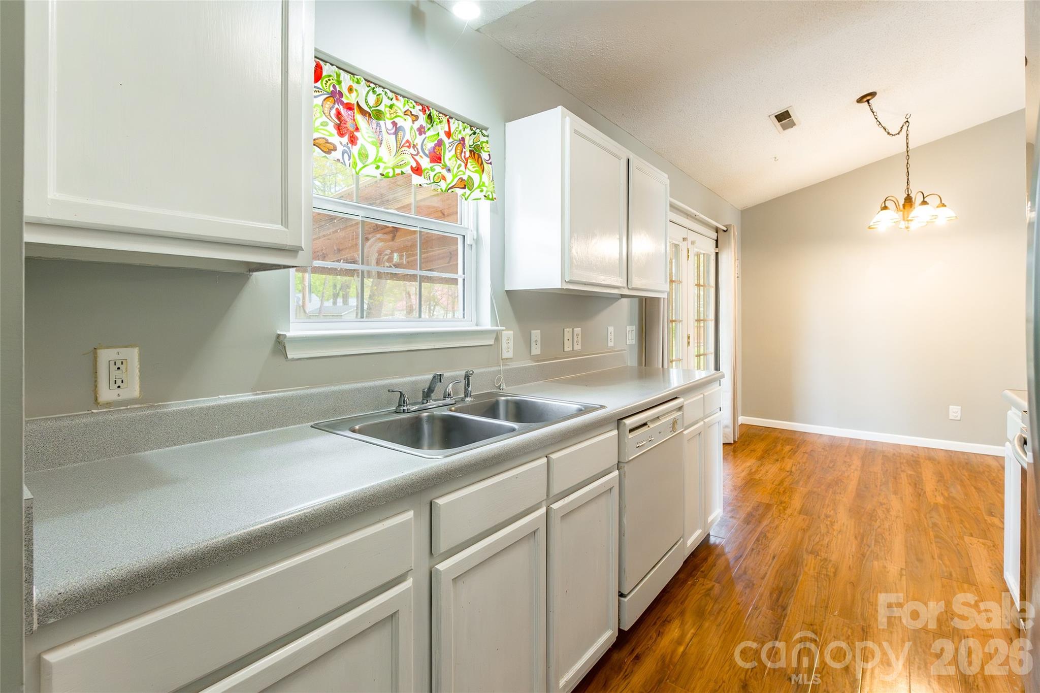 1021 Cedar Creek Road Kannapolis, NC 28083 - Photo 13 of 29 a kitchen with a sink and a window