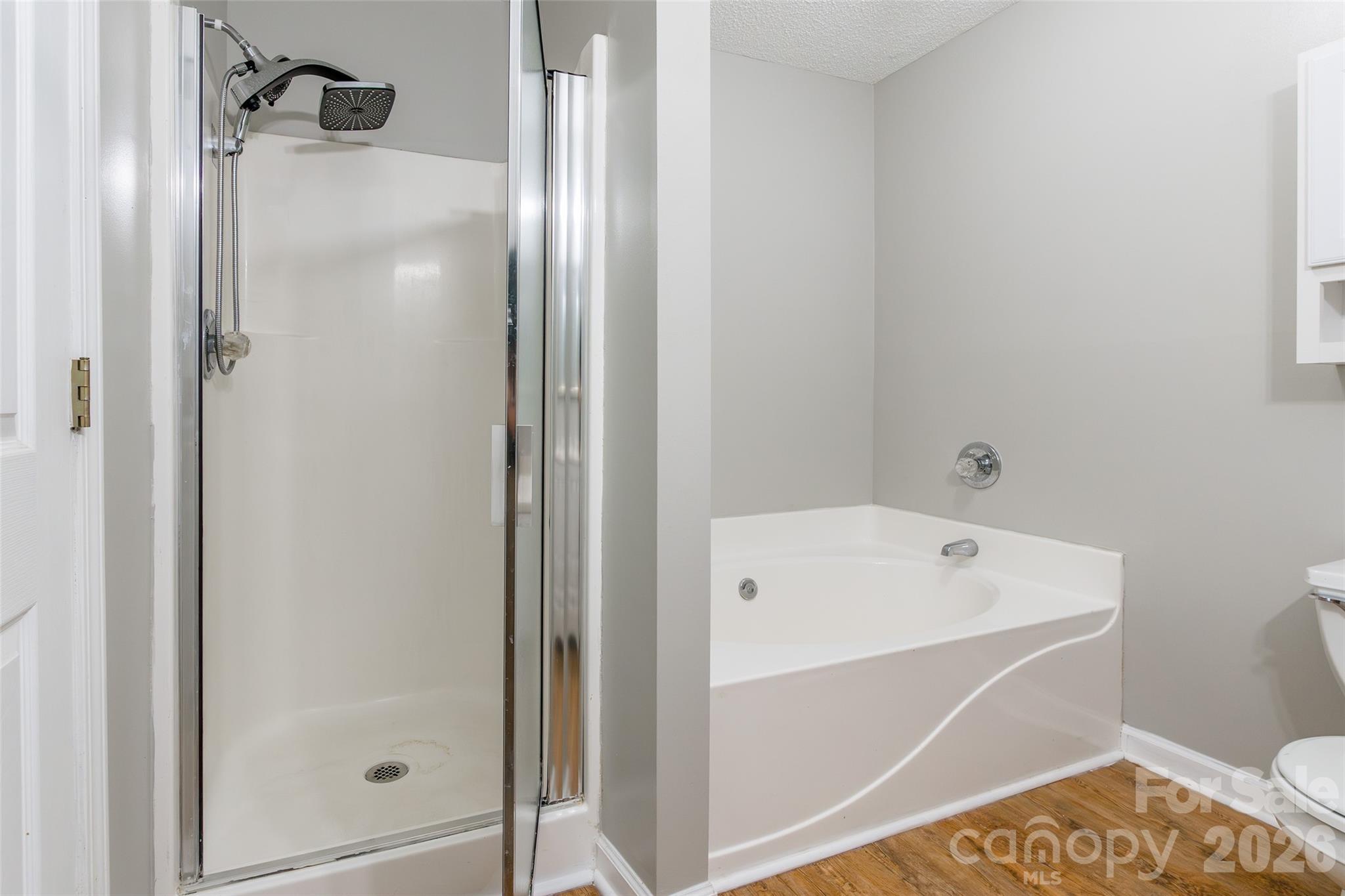 1021 Cedar Creek Road Kannapolis, NC 28083 - Photo 17 of 29 a bathroom with a tub and shower