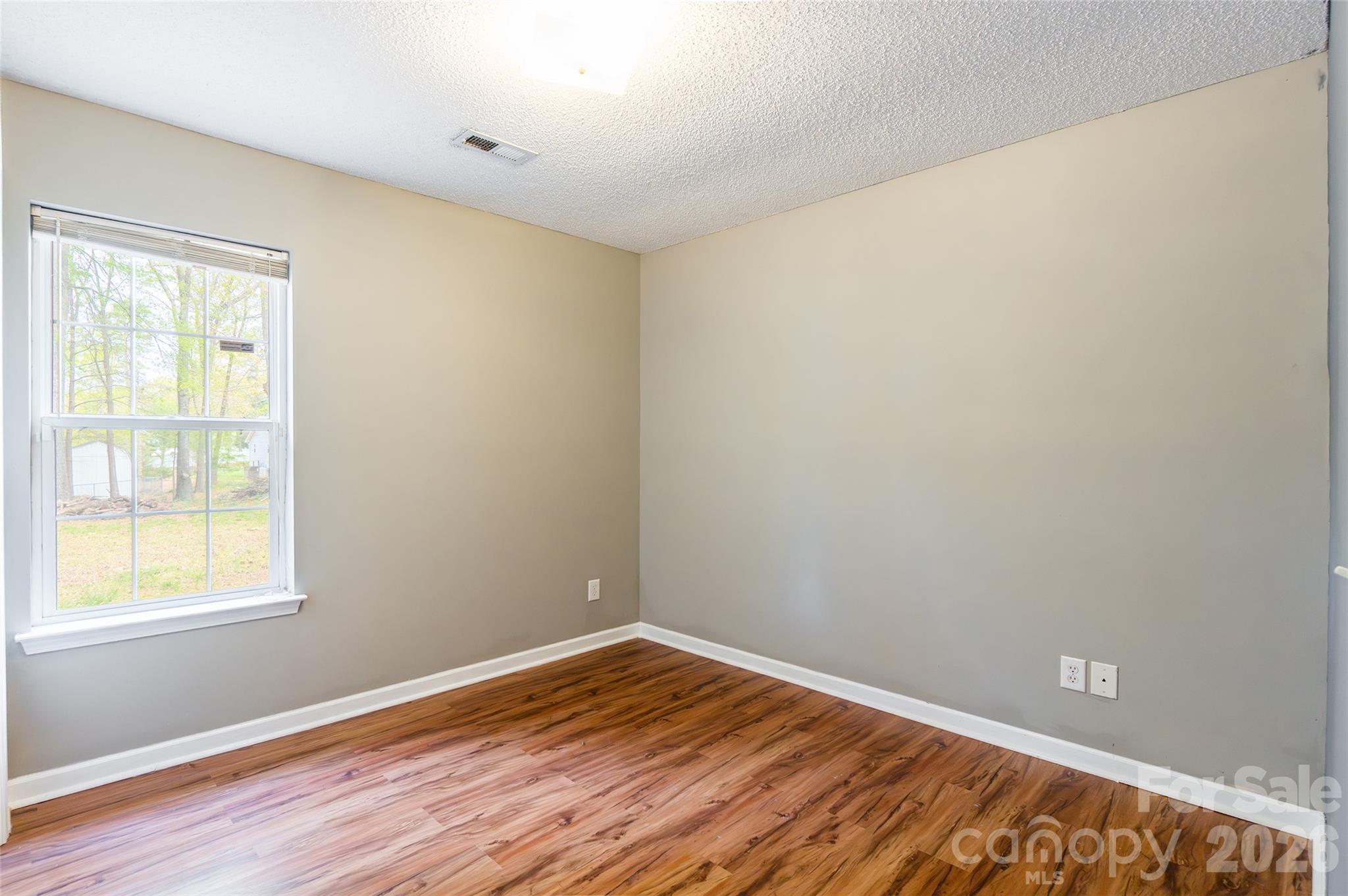 1021 Cedar Creek Road Kannapolis, NC 28083 - Photo 19 of 29 a view of empty room with wooden floor