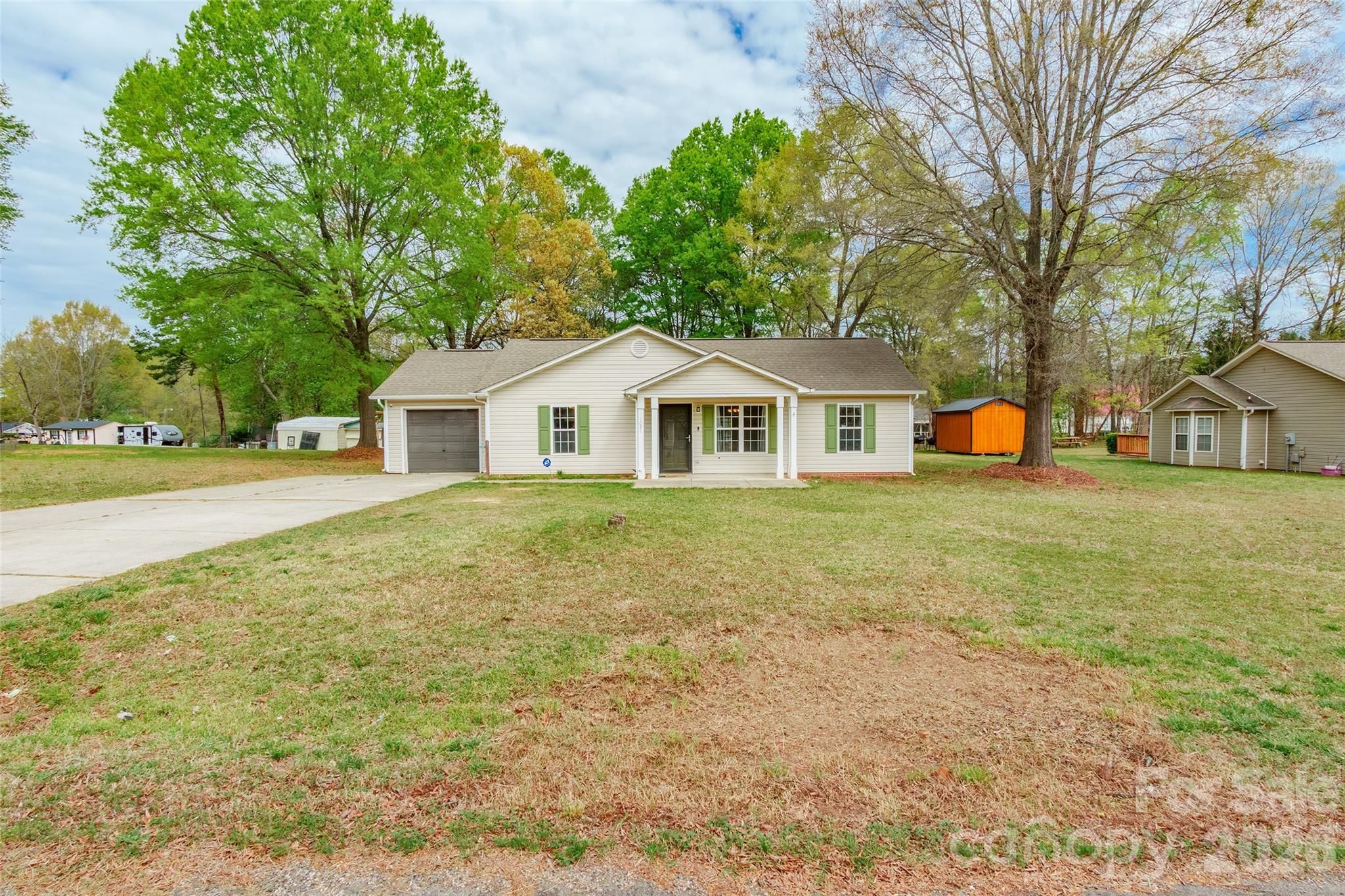 1021 Cedar Creek Road Kannapolis, NC 28083 - Photo 2 of 29 a view of a house with pool and yard