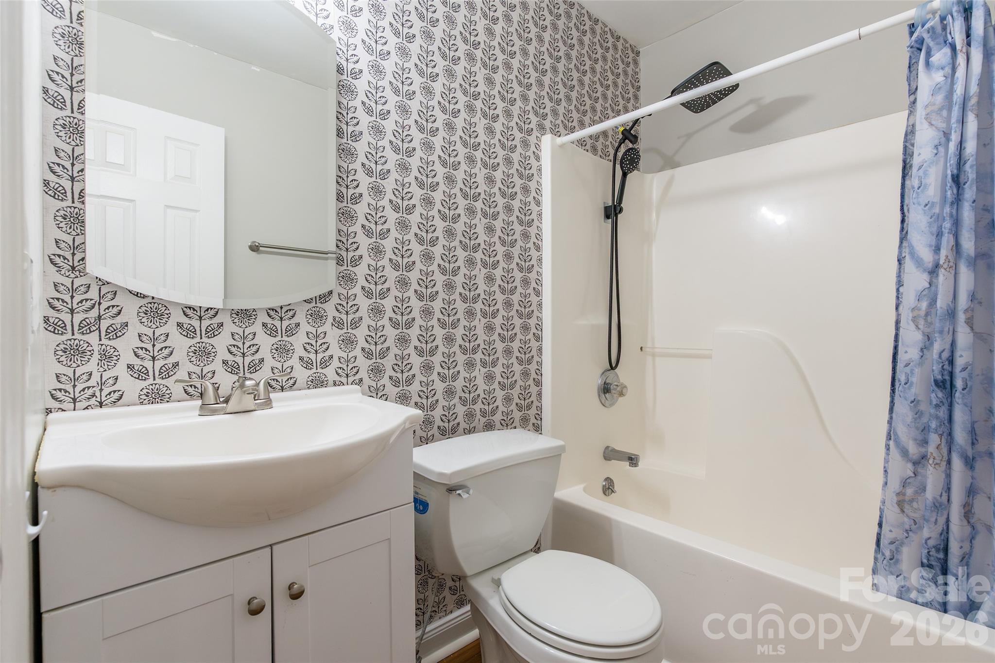 1021 Cedar Creek Road Kannapolis, NC 28083 - Photo 23 of 29 a bathroom with a sink toilet and shower