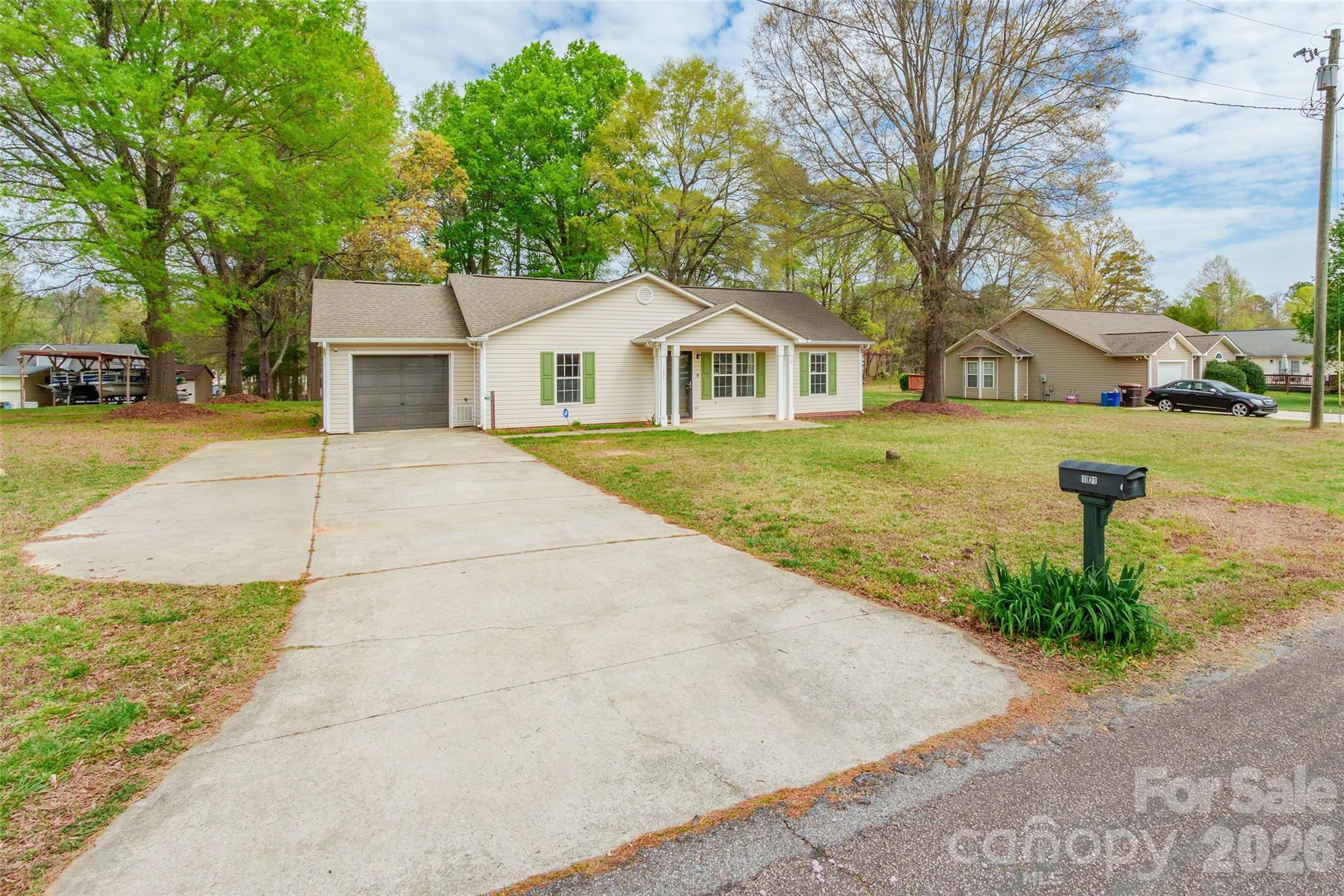 1021 Cedar Creek Road Kannapolis, NC 28083 - Photo 3 of 29 a view of a house with a yard