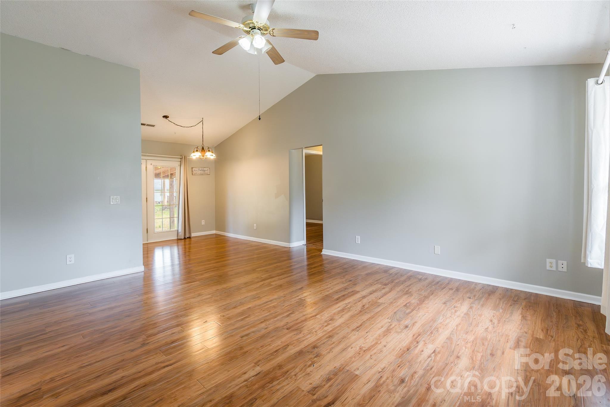 1021 Cedar Creek Road Kannapolis, NC 28083 - Photo 5 of 29 a view of a livingroom with wooden floor