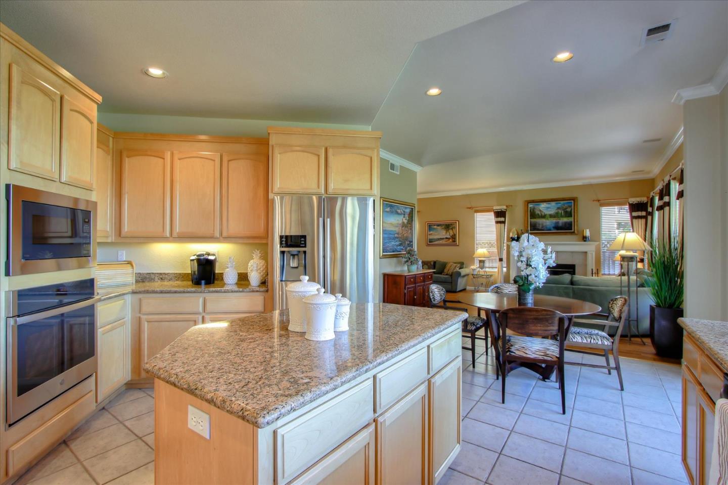 5869 Capilano Drive San Jose, CA 95138 - Photo 15 of 48 a kitchen with sink refrigerator and cabinets