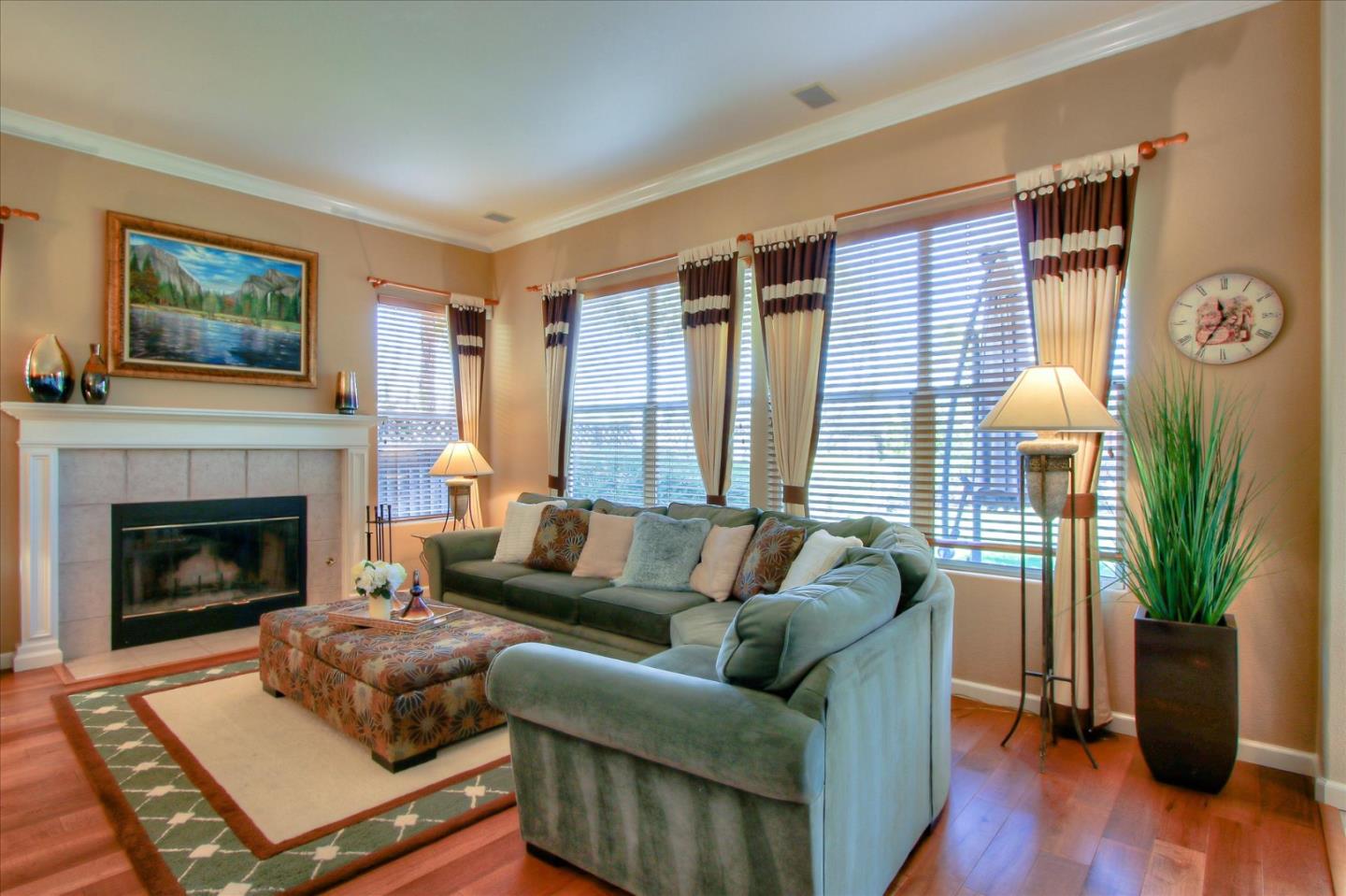 5869 Capilano Drive San Jose, CA 95138 - Photo 19 of 48 a living room with furniture and a fireplace