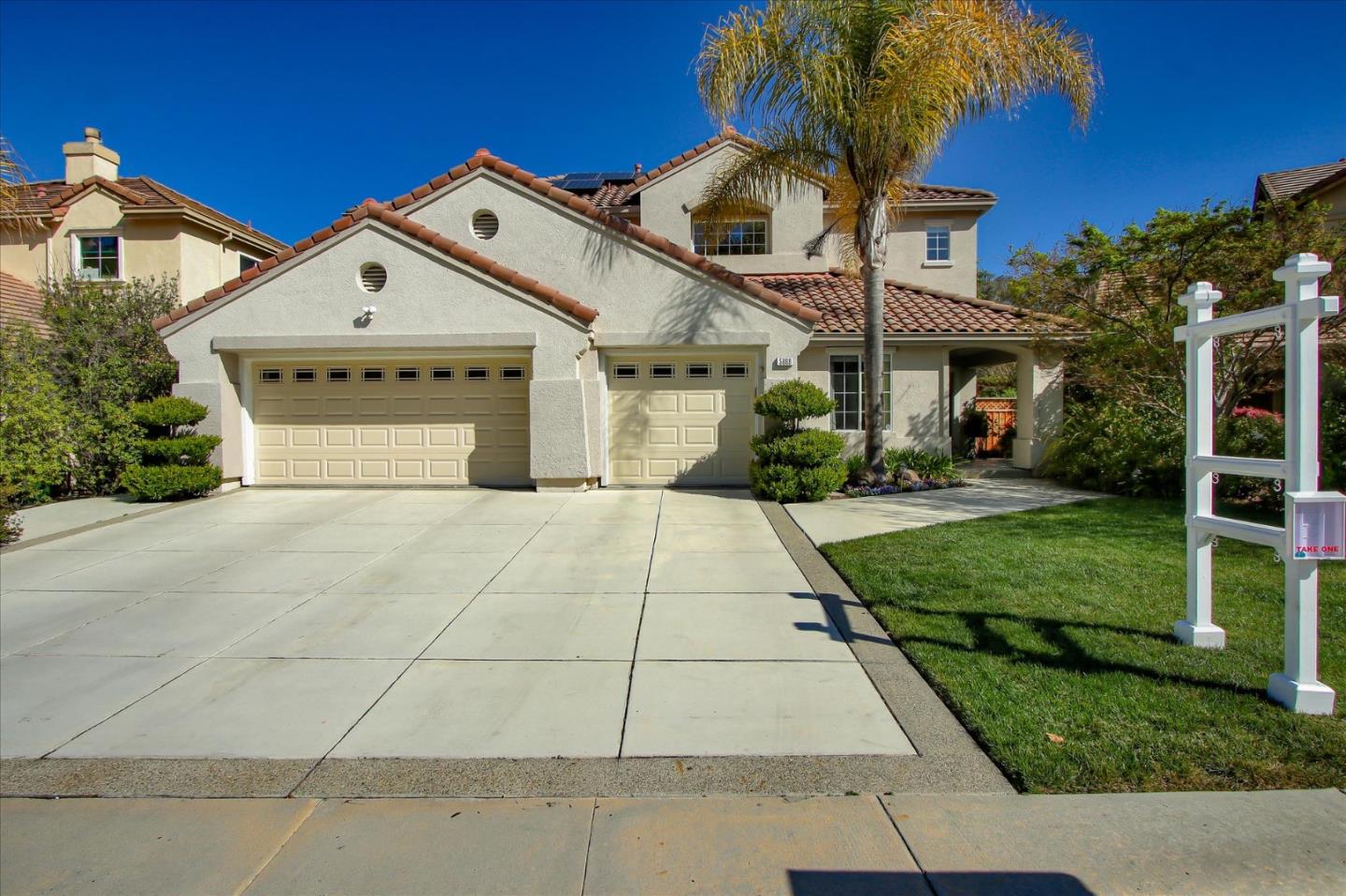 5869 Capilano Drive San Jose, CA 95138 - Photo 2 of 48 a front view of a house with a yard and potted plants