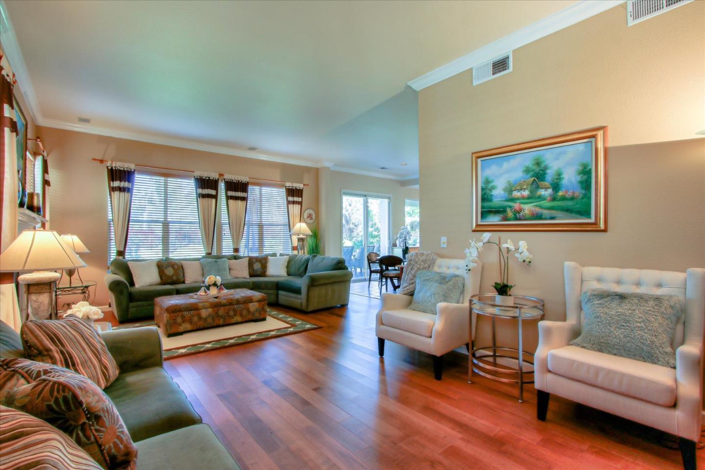 5869 Capilano Drive San Jose, CA 95138 - Photo 23 of 48 a living room with furniture or couch and a wooden floor