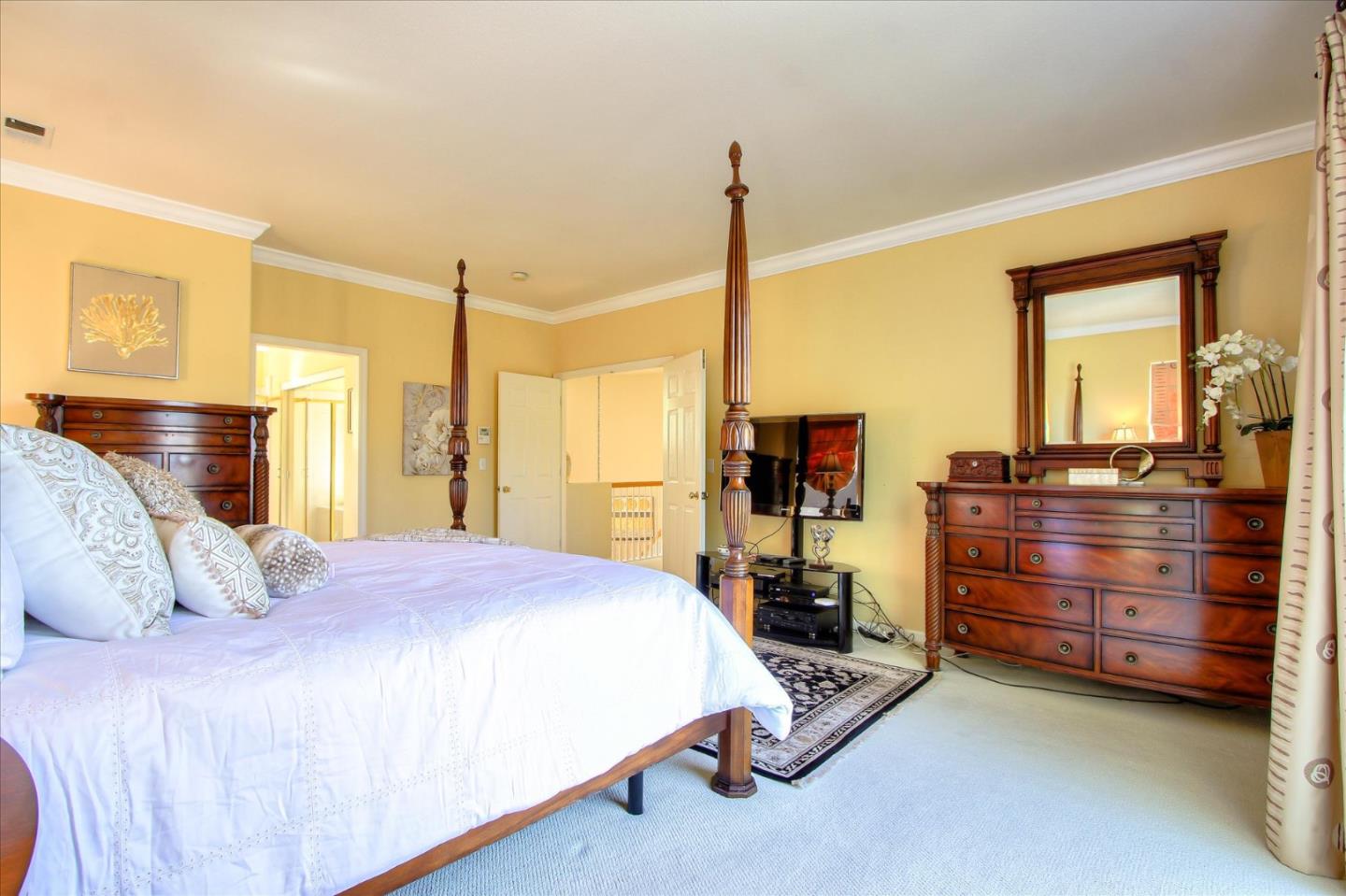 5869 Capilano Drive San Jose, CA 95138 - Photo 26 of 48 a bedroom with a bed and a dresser
