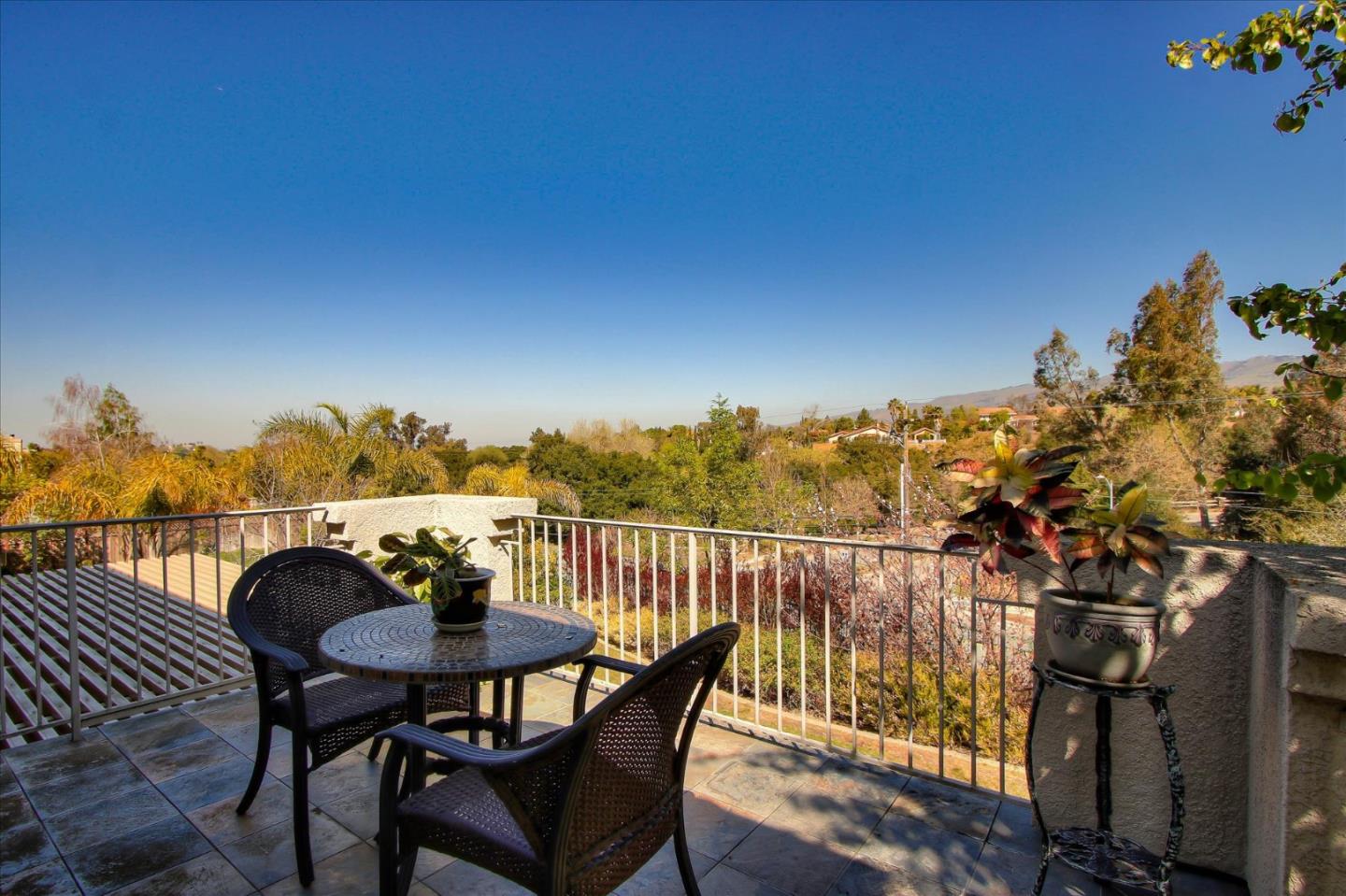 5869 Capilano Drive San Jose, CA 95138 - Photo 31 of 48 a view of a balcony with furniture and wooden floor