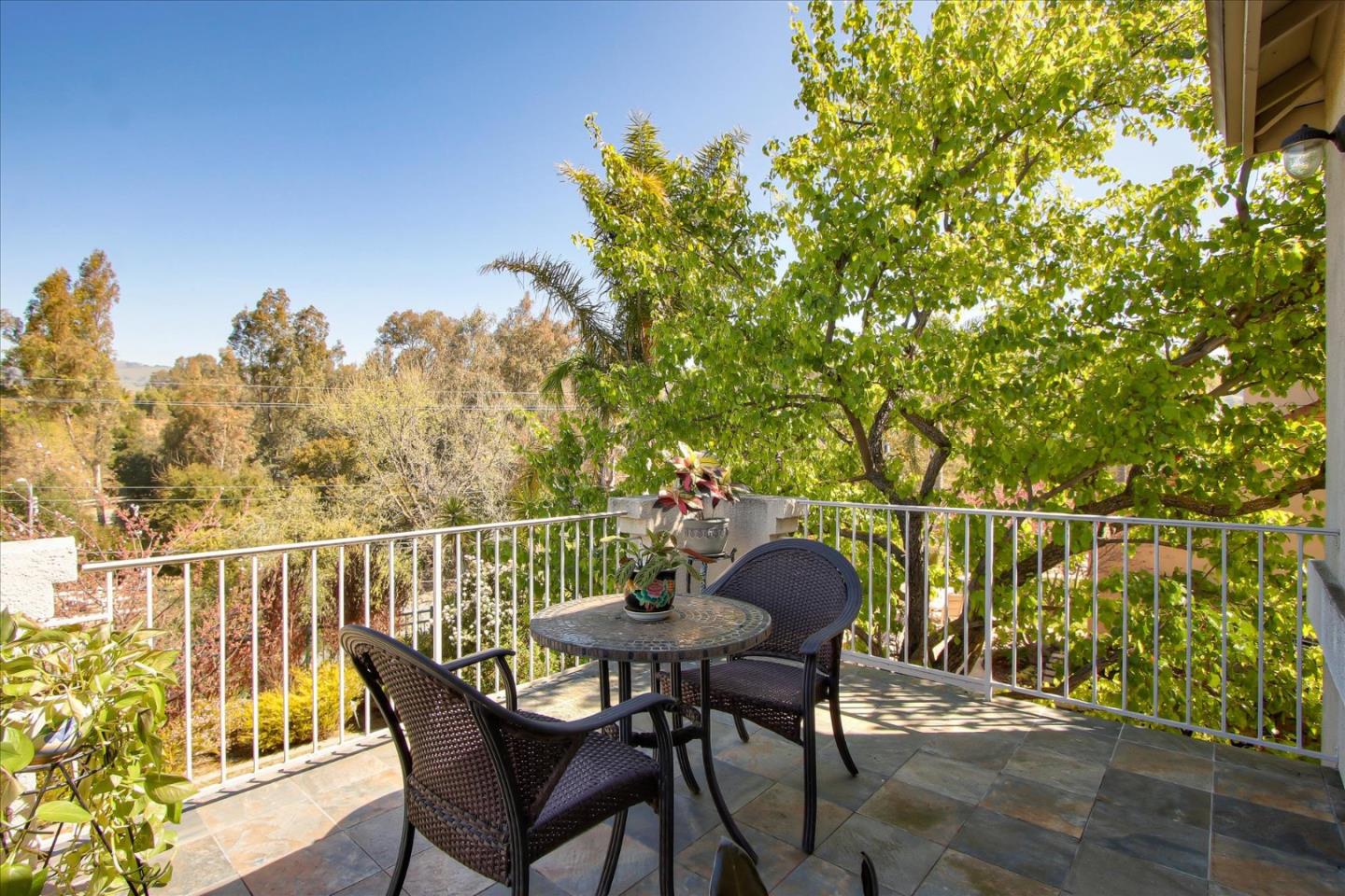 5869 Capilano Drive San Jose, CA 95138 - Photo 33 of 48 a view of a chairs and table on the deck