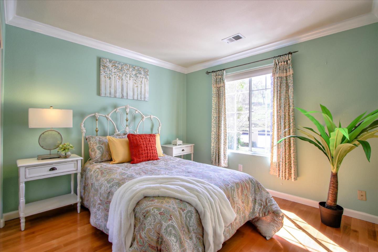 5869 Capilano Drive San Jose, CA 95138 - Photo 35 of 48 a bedroom with a bed and a window