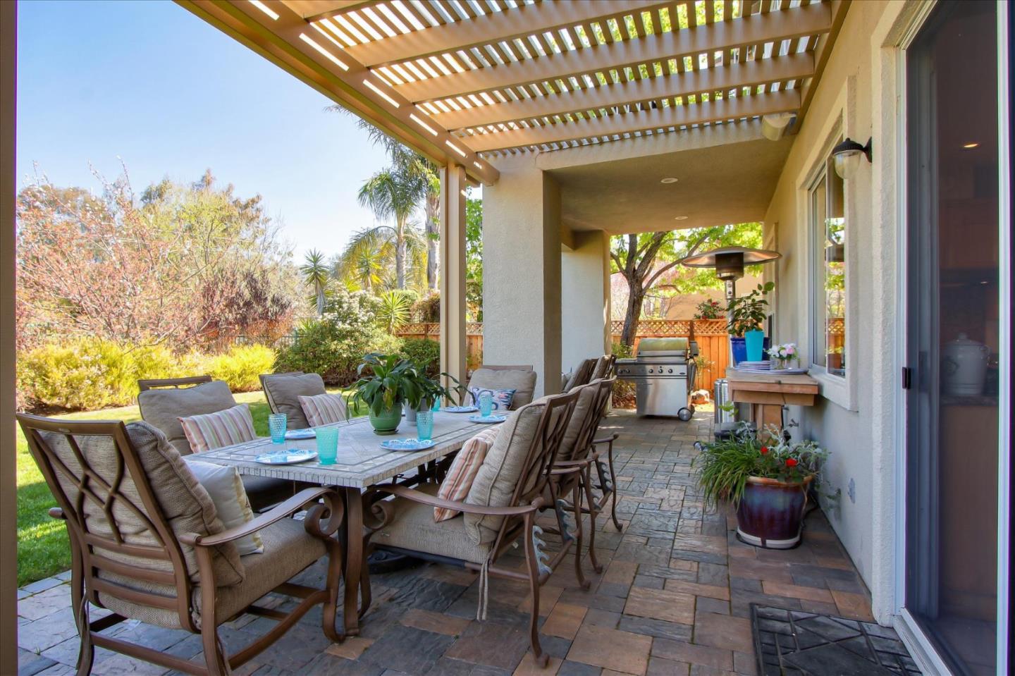 5869 Capilano Drive San Jose, CA 95138 - Photo 40 of 48 a view of a patio with a table and chairs