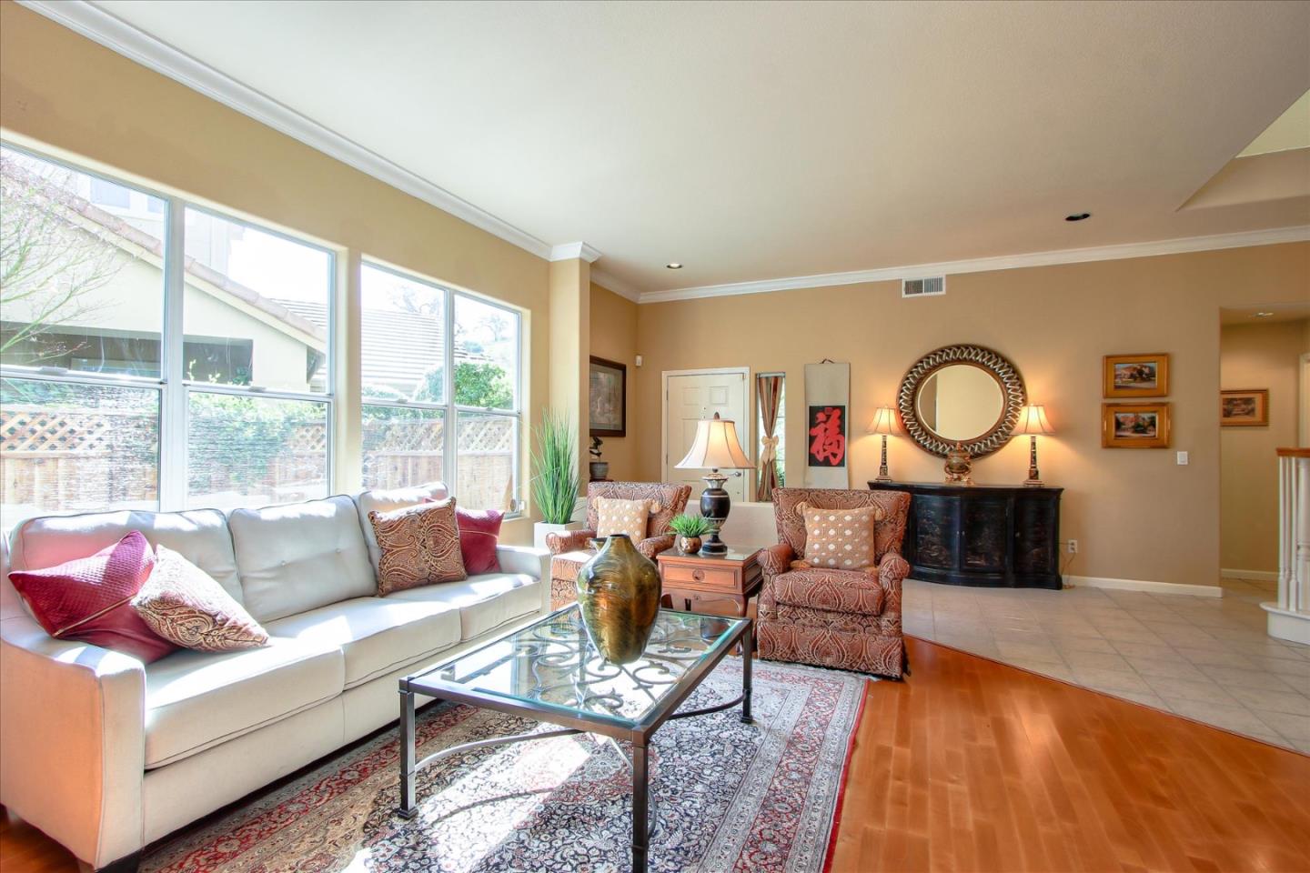 5869 Capilano Drive San Jose, CA 95138 - Photo 5 of 48 a living room with furniture and a large window
