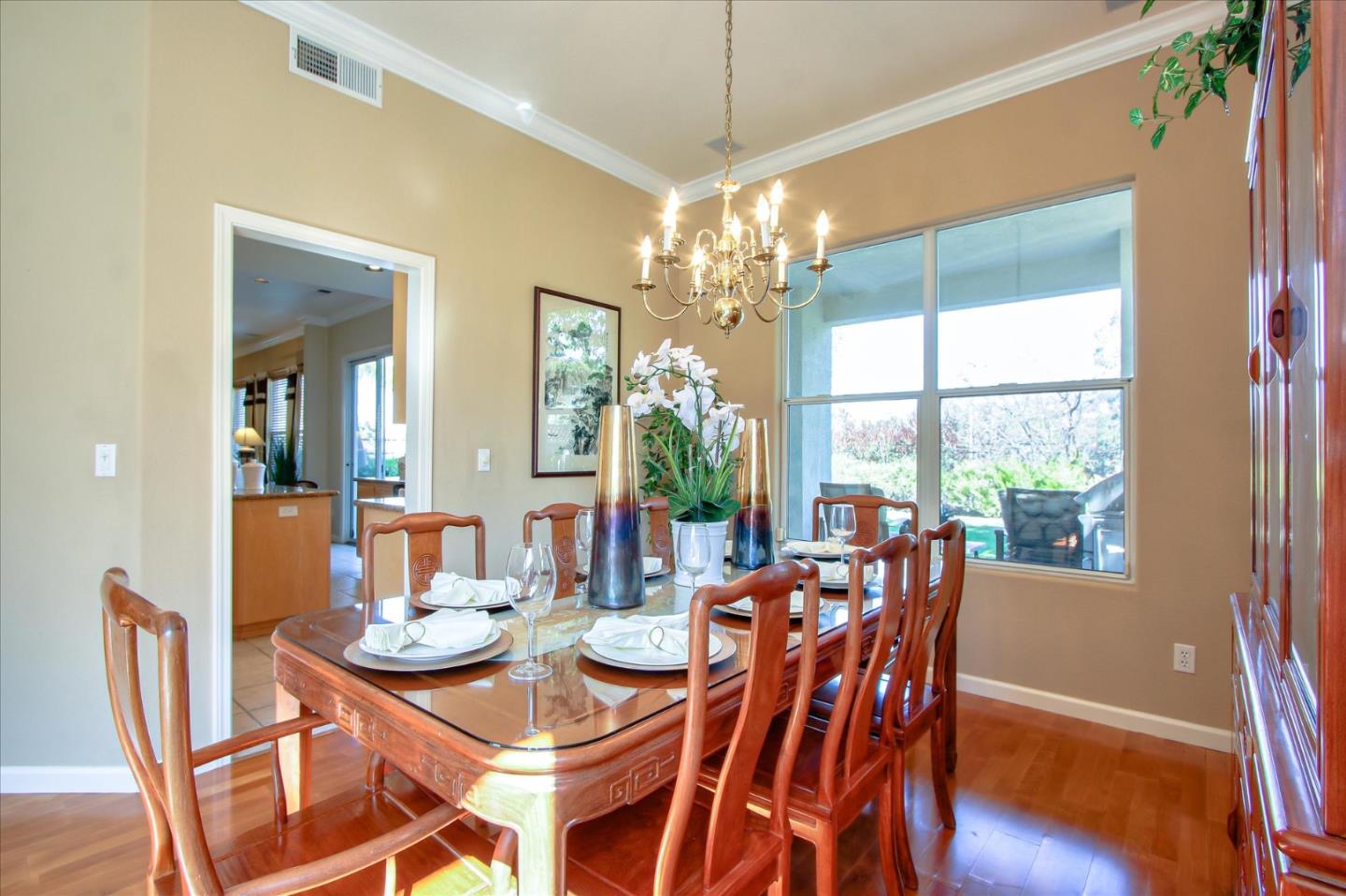 5869 Capilano Drive San Jose, CA 95138 - Photo 10 of 48 a view of a dining room with furniture window and wooden floor