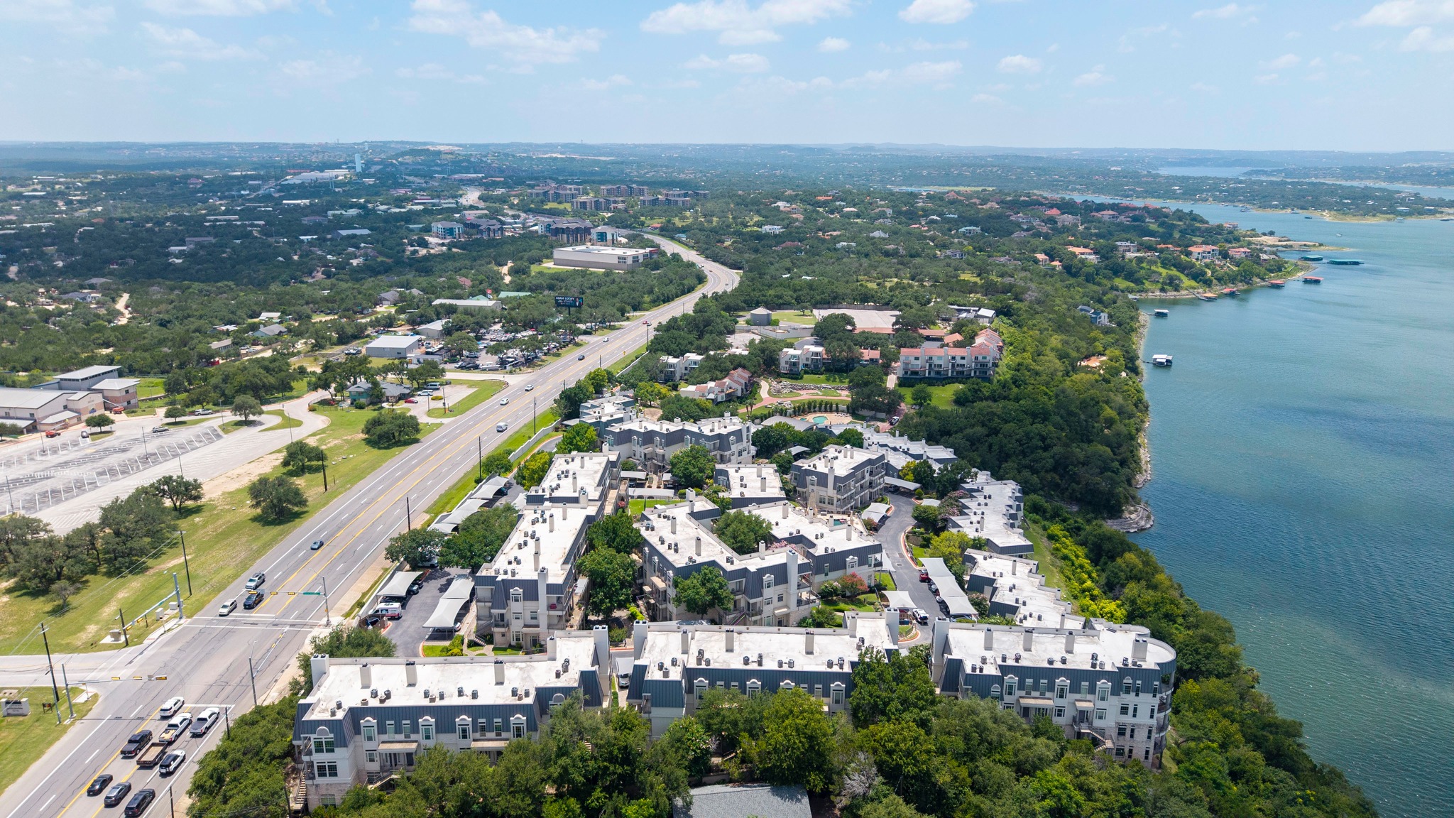 2918 Ranch Road 620 North, Unit S242 Austin, TX 78734 - Photo 32 of 35 Perched above the water, this multi-building community offers expansive views and serene waterfront living.