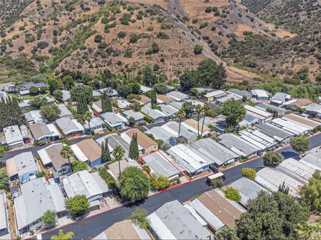 5700 Carbon Canyon Road, Unit 130 Brea, CA 92823 - Photo 16 of 17 an aerial view of a city with lots of residential buildings