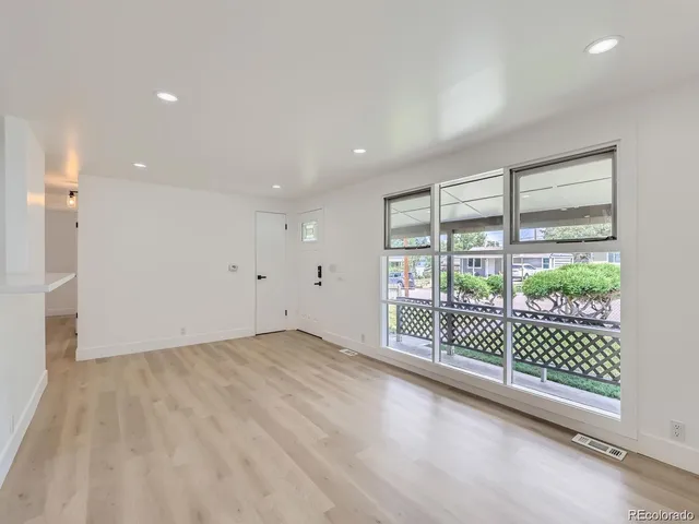a view of a room with sliding glass door