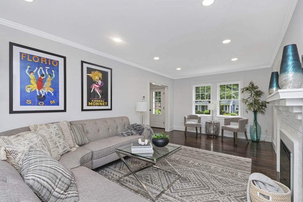22 Stafford Road Newton, MA 02459 - Photo 3 of 28 a living room with furniture a fireplace and a large window