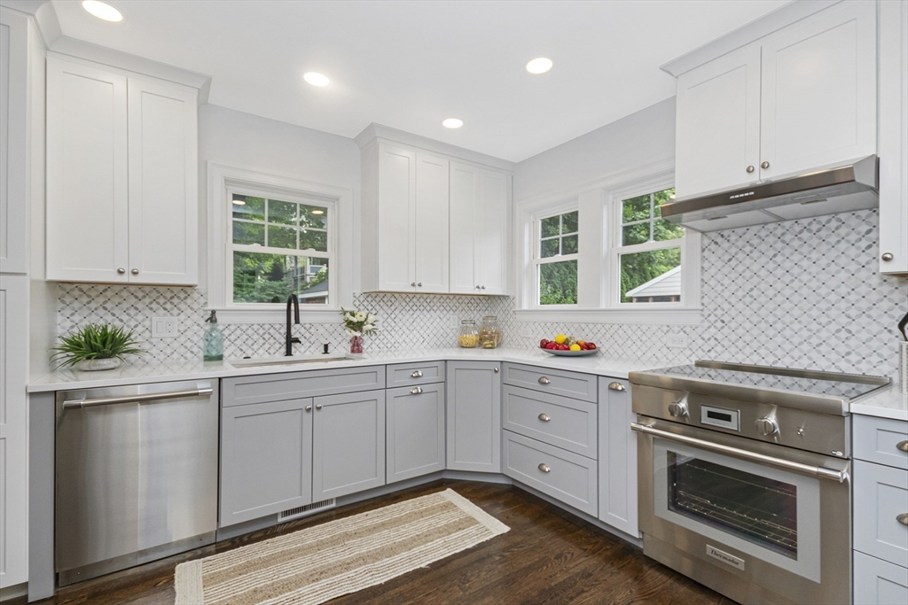 22 Stafford Road Newton, MA 02459 - Photo 8 of 28 a kitchen that has a sink and a stove in it