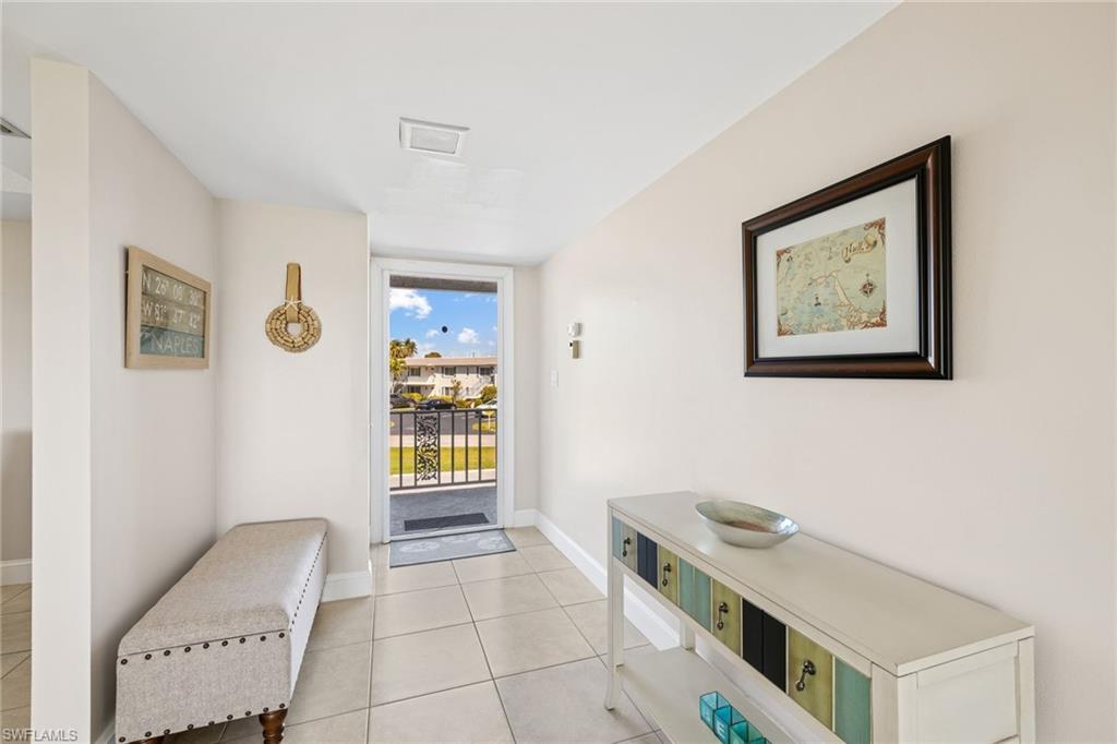 108 Penny Lane, Unit 4 Naples, FL 34112 - Photo 3 of 31 a view of workspace with furniture and window