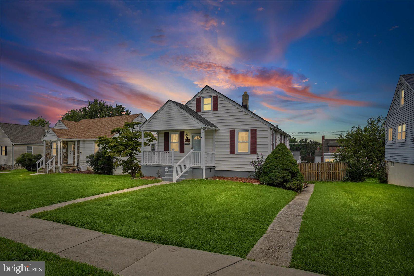 4228 Thorncliff Road Nottingham, MD 21236 - Photo 1 of 42 Charming home under a vibrant sky.
