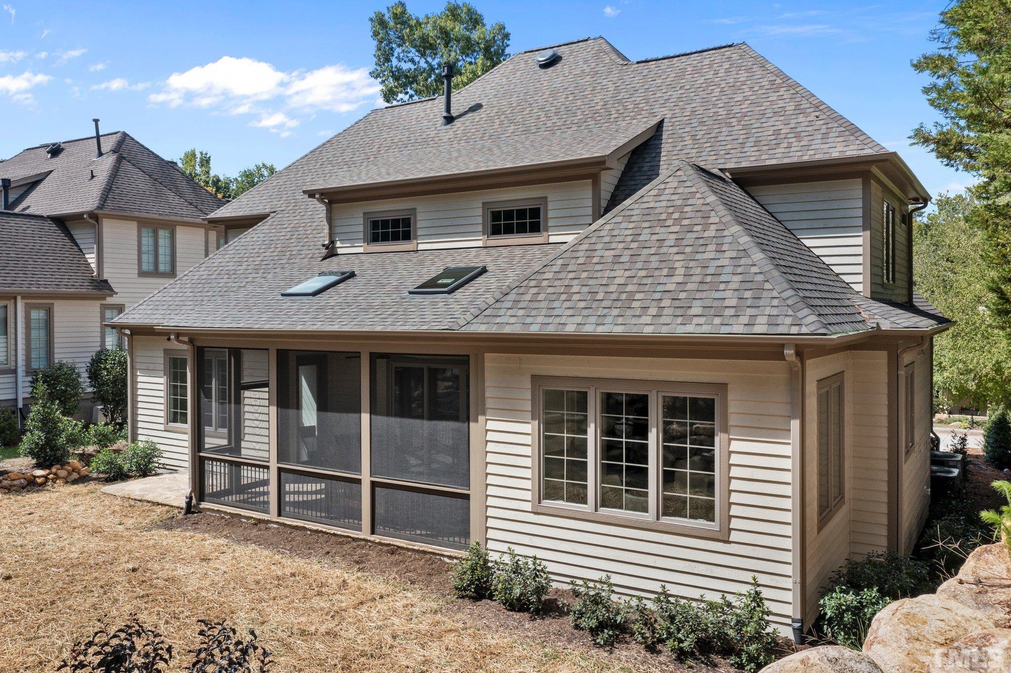 20003 Bragg Chapel Hill, NC 27517 - Photo 9 of 36 a front view of a house with a balcony