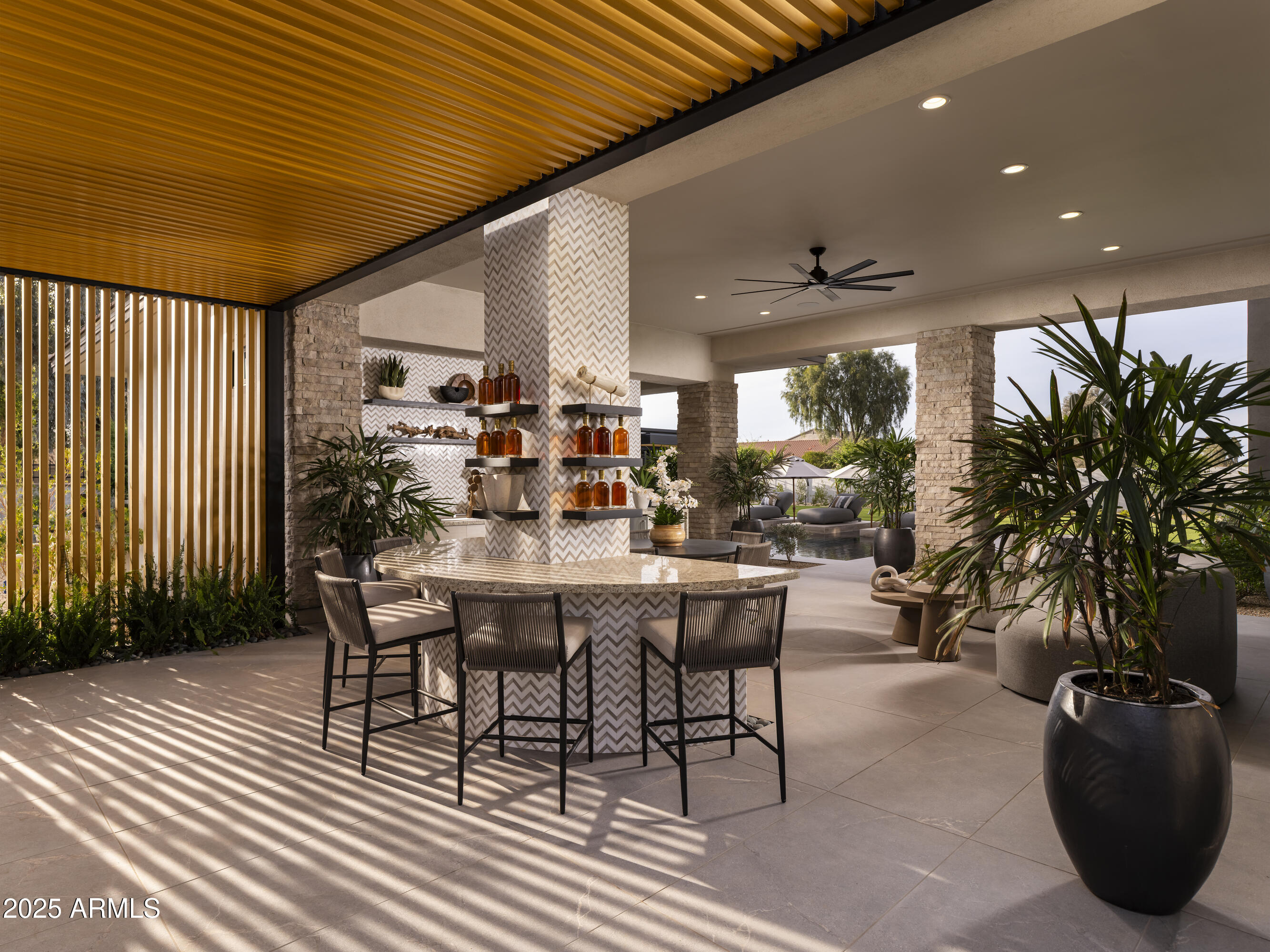 21922 South 193rd Way Queen Creek, AZ 85142 - Photo 17 of 38 a dinning table and chairs in patio of a house