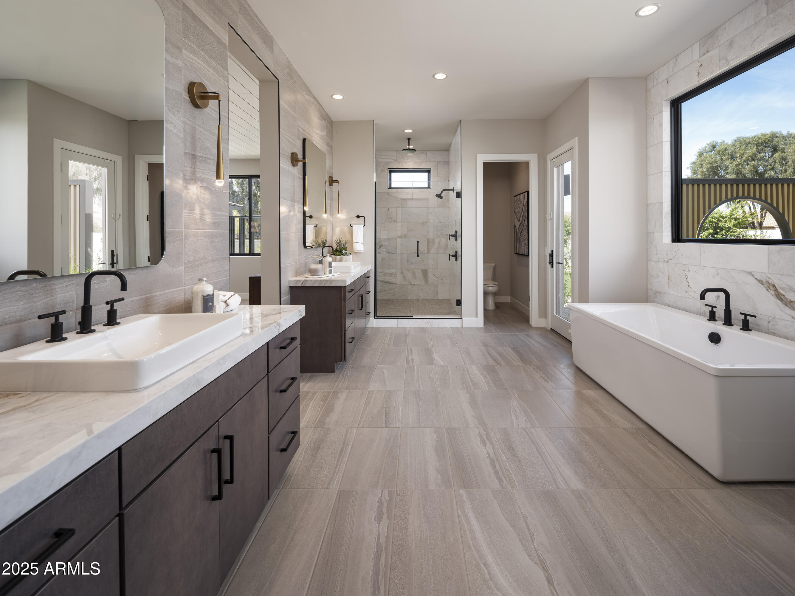 21922 South 193rd Way Queen Creek, AZ 85142 - Photo 20 of 38 a spacious bathroom with a double vanity sink a mirror and a bathtub