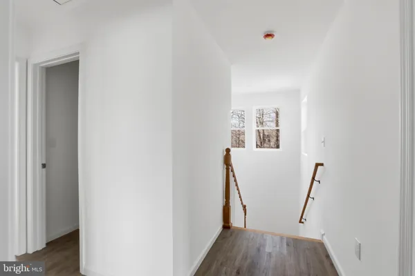 a view of hallway with stairs
