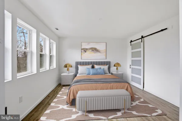 a bathroom with a double vanity sink and mirror