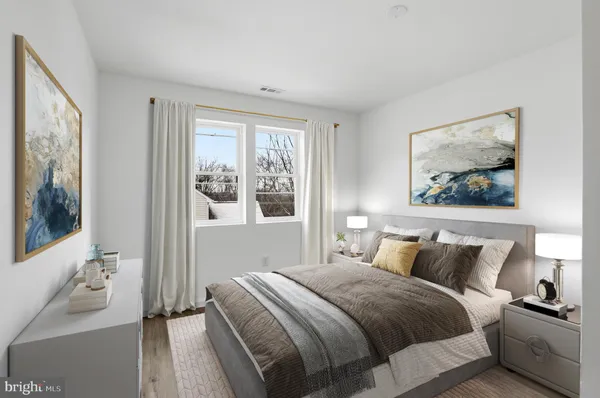 a view of balcony with wooden floor